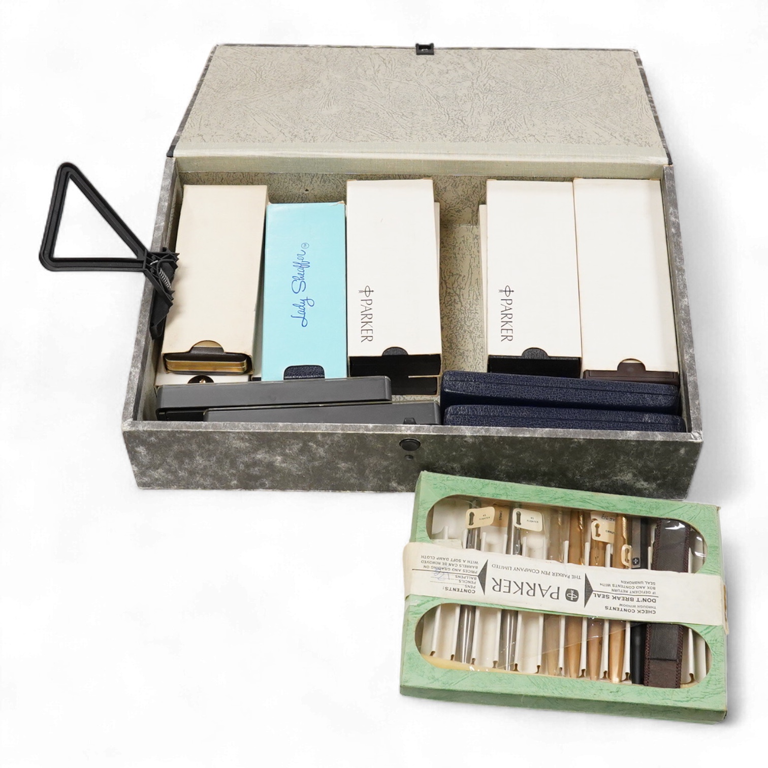 A folder of Parker and Sheaffer pens and ball pens, mostly boxed and a Parker Pen box containing eight items